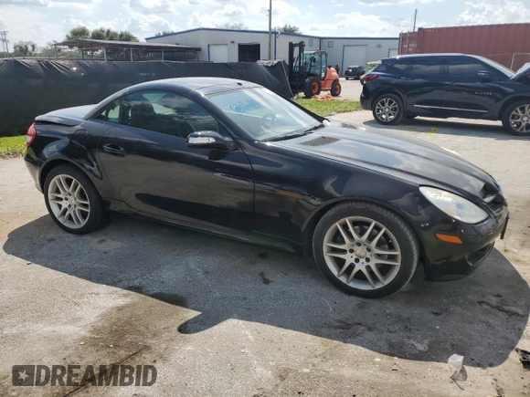 2007 Mercedes-Benz SLK-Class 3.0L with VIN WDBWK54F27F138919, listed as a Copart auction lot 72077514 with 64,519 mi miles and Salvage Title. Bid and sale history available at carsss.com. Image 4.