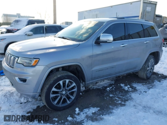 2018 Jeep Grand Cherokee High Altitude with VIN 1C4RJFCG5JC355584, listed as a IAAI auction lot 41403722 with 96,273 mi miles. Bid and sale history available at carsss.com. Image 17.