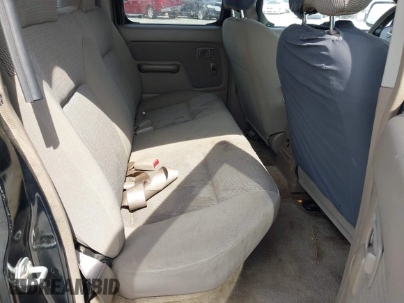 2004 Nissan Frontier XE z VIN 1N6ED29X24C421886, wystawiony jako IAAI lot #42366824 z przebiegiem 184 941 mil mil oraz . Historia ofert i sprzedaży dostępna na DreamBid. Obrazek 8.