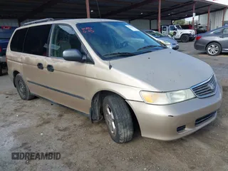 2001 Honda Odyssey LX z VIN 2HKRL185X1H553358, wystawiony jako IAAI lot #42259989 z przebiegiem 228 159 mil mil oraz . Historia ofert i sprzedaży dostępna na DreamBid. Obrazek 1.