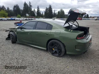 2019 Dodge Charger Scat Pack z VIN 2C3CDXGJ9KH593210, wystawiony jako Copart lot #56586775 z przebiegiem 73 405 mil mil oraz Szkoda całkowita • Salvage title. Historia ofert i sprzedaży dostępna na DreamBid. Obrazek 2.
