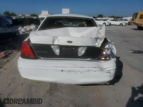 2005 Ford Police Interceptor z VIN 2FAFP71W35X165072, wystawiony jako Copart lot #56547865 z przebiegiem 352 713 mil mil oraz Szkoda całkowita • Salvage title. Historia ofert i sprzedaży dostępna na DreamBid. Obrazek 6.