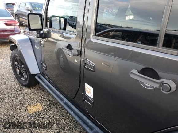 2018 Jeep Wrangler JK Unlimited Sport S with VIN 1C4HJWDG9JL867309, listed as a Copart auction lot 74341634 with 151,238 mi miles and Non Repairable. Bid and sale history available at carsss.com. Image 13.
