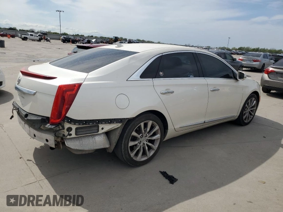 2013 Cadillac XTS Luxury with VIN 2G61R5S31D9100234, listed as a Copart auction lot 50174175 with 98,600 mi miles and Salvage title. Bid and sale history available at DreamBid. Image 3.