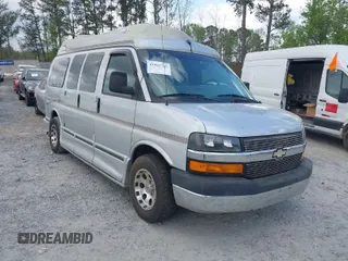 2004 Chevrolet Express Passenger z VIN 1GBFG15T241154485, wystawiony jako IAAI lot #41965765 z przebiegiem 186 737 mil mil oraz . Historia ofert i sprzedaży dostępna na DreamBid. Obrazek 1.