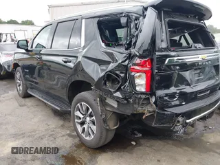 2023 Chevrolet Tahoe LT with VIN 1GNSKNKD8PR105849, listed as a IAAI auction lot 42308786 with 51,748 mi miles and . Bid and sale history available at DreamBid. Image 3.
