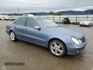 2004 Mercedes-Benz E-Class 5.0L with VIN WDBUF70J94A406133, listed as a Copart auction lot 44396845 with 123,999 mi miles and Salvage Title. Bid and sale history available at carsss.com. Image 4.