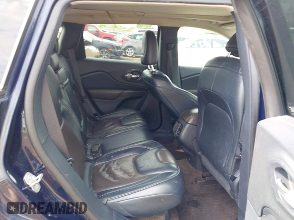 2015 Jeep Cherokee Limited with VIN 1C4PJLDBXFW658441, listed as a IAAI auction lot 42167135 with Not Provided miles and . Bid and sale history available at DreamBid. Image 8.
