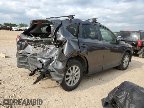 2015 Mazda CX-5 Touring with VIN JM3KE4CY0F0517821, listed as a Copart auction lot 53937195 with 165,852 mi miles and Salvage Title. Bid and sale history available at DreamBid. Image 3.