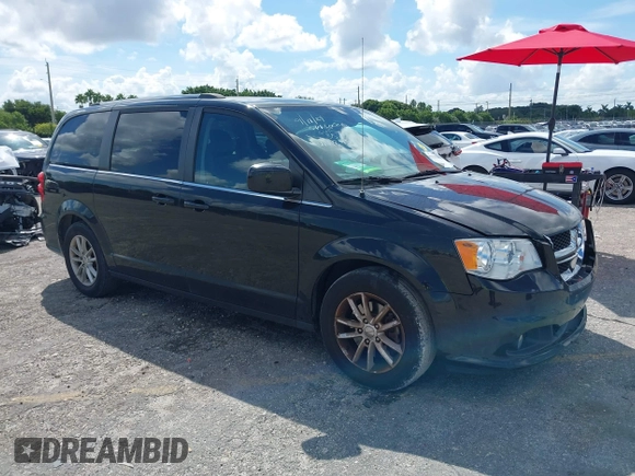 2019 Dodge Grand Caravan SXT with VIN 2C4RDGCG5KR797853, listed as a IAAI auction lot 40332854 with 81,197 mi miles and . Bid and sale history available at DreamBid. Image 1.