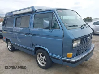 1989 Volkswagen Vanagon with VIN WV2YB0252KH059286, listed as a IAAI auction lot 42137080 with 130,604 mi miles and . Bid and sale history available at DreamBid. Image 1.