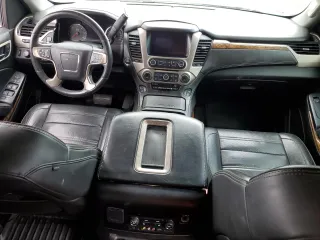 2015 GMC Yukon Denali with VIN 1GKS1CKJ0FR140877, listed as a Copart auction lot 50917985 with 180,726 mi miles and Salvage Title. Bid and sale history available at carsss.com. Image 8.