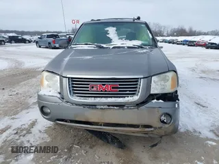 2007 GMC Envoy SLE with VIN 1GKDT13S072246688, listed as a IAAI auction lot 41258265 with 218,001 mi miles. Bid and sale history available at carsss.com. Image 12.