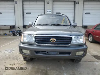 1999 Toyota Land Cruiser z VIN JT3HT05J8X0047612, wystawiony jako Copart lot #60983565 z przebiegiem 390 718 mil mil oraz Czysty tytuł • Clean title. Historia ofert i sprzedaży dostępna na DreamBid. Obrazek 5.