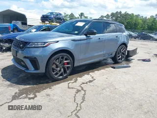 2020 Land Rover Range Rover Velar z VIN SALYU2EE1LA258140, wystawiony jako IAAI lot #42326439 z przebiegiem 61 827 mil mil oraz . Historia ofert i sprzedaży dostępna na DreamBid. Obrazek 2.