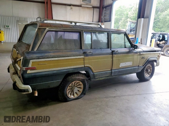 1986 Jeep Grand Wagoneer с VIN 1JCNJ15U5GT147524, выставлен на аукционе Copart как лот 57421255 с пробегом 112 292 миль миль и Списание • Salvage title. История ставок и продаж доступна на DreamBid. Изображение 3.