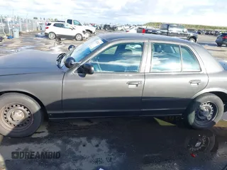 1999 Ford Crown Victoria Police with VIN 2FAFP71W9XX187581, listed as a IAAI auction lot 41522223 with 94,889 mi miles. Bid and sale history available at carsss.com. Image 14.