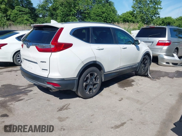 2019 Honda CR-V Touring с VIN JHLRW2H98KX003911, выставлен на аукционе IAAI как лот 42306400 с пробегом 105 780 миль миль и . История ставок и продаж доступна на DreamBid. Изображение 4.