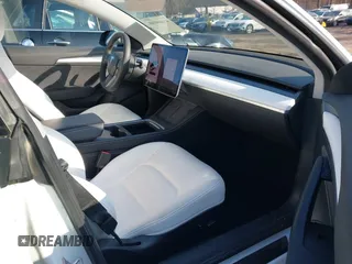 2021 Tesla Model 3 Long Range with VIN 5YJ3E1EB1MF056759, listed as a IAAI auction lot 41464108 with 48,694 mi miles and . Bid and sale history available at carsss.com. Image 5.