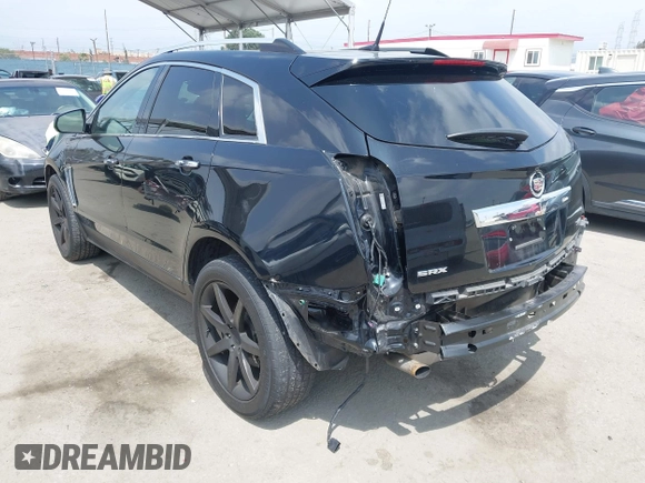 2014 Cadillac SRX Luxury Collection with VIN 3GYFNBE34ES639647, listed as a IAAI auction lot 42108140 with 99,740 mi miles and . Bid and sale history available at DreamBid. Image 3.