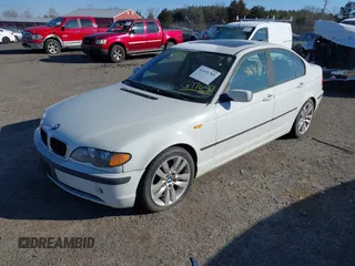 2002 BMW 3 Series 325i with VIN WBAET37492NG77657, listed as a IAAI auction lot 41691705 with 163,700 mi miles. Bid and sale history available at carsss.com. Image 2.