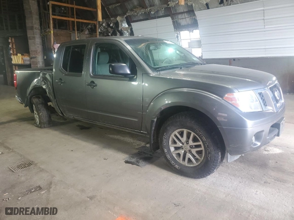 2016 Nissan Frontier SV with VIN 1N6AD0EV8GN714871, listed as a Copart auction lot 49217685 with 104,606 mi miles and Salvage Title. Bid and sale history available at carsss.com. Image 4.