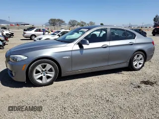 2012 BMW 5 Series 528i with VIN WBAXG5C59CDX04125, listed as a Copart auction lot 52450415 with 136,293 mi miles and Clean Title. Bid and sale history available at carsss.com. Image 1.