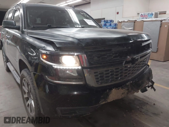 2015 Chevrolet Tahoe LT z VIN 1GNSCBKC1FR228488, wystawiony jako IAAI lot #41933869 z przebiegiem 164 523 mil mil oraz . Historia ofert i sprzedaży dostępna na DreamBid. Obrazek 6.