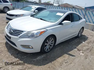 2014 Hyundai Azera Limited z VIN KMHFH4JG2EA373608, wystawiony jako IAAI lot #42125063 z przebiegiem 121 111 mil mil oraz . Historia ofert i sprzedaży dostępna na DreamBid. Obrazek 2.