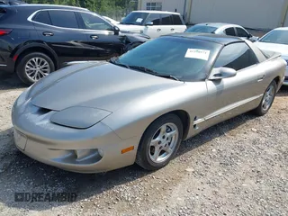 2002 Pontiac Firebird Firebird z VIN 2G2FS22K722105297, wystawiony jako IAAI lot #42350571 z przebiegiem 249 177 mil mil oraz . Historia ofert i sprzedaży dostępna na DreamBid. Obrazek 2.