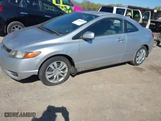 2007 Honda Civic Cpe LX with VIN 2HGFG11637H582827, listed as a IAAI auction lot 41895677 with 237,433 mi miles. Bid and sale history available at carsss.com. Image 2.
