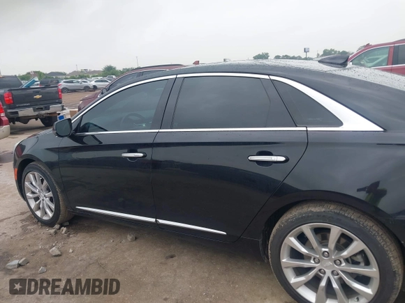 2017 Cadillac XTS Luxury with VIN 2G61M5S38H9151248, listed as a IAAI auction lot 42111780 with 76,494 mi miles. Bid and sale history available at carsss.com. Image 14.