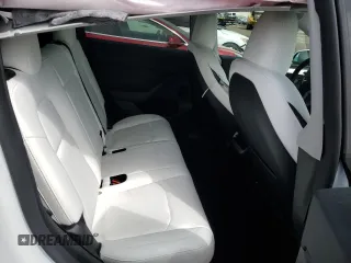 2023 Tesla Model Y Long Range z VIN 7SAYGDEE3PF815088, wystawiony jako Copart lot #54849895 z przebiegiem 19 637 mil mil oraz Szkoda całkowita • Salvage title. Historia ofert i sprzedaży dostępna na DreamBid. Obrazek 11.