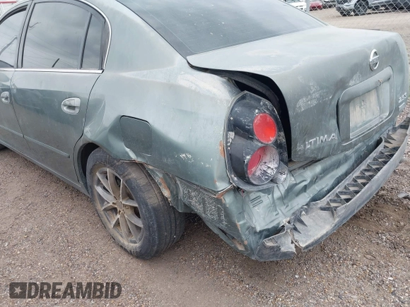 2006 Nissan Altima 2.5 with VIN 1N4AL11D46N325738, listed as a IAAI auction lot 42097809 with 299,243 mi miles. Bid and sale history available at carsss.com. Image 14.