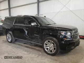 2019 Chevrolet Suburban Premier with VIN 1GNSKJKJ8KR302849, listed as a Copart auction lot 87717275 with 69,498 mi miles and Salvage Title. Bid and sale history available at DreamBid. Image 4.