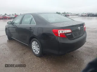 2014 Toyota Camry L with VIN 4T1BF1FK0EU823710, listed as a IAAI auction lot 42153523 with 105,468 mi miles and . Bid and sale history available at DreamBid. Image 3.