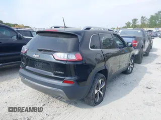 2019 Jeep Cherokee Limited with VIN 1C4PJMDX2KD235618, listed as a IAAI auction lot 40672263 with 82,117 mi miles and . Bid and sale history available at carsss.com. Image 4.