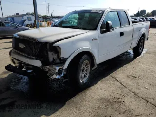 2006 Ford F-150 XLT with VIN 1FTPX12516KB96780, listed as a Copart auction lot 55621015 with 168,831 mi miles and Salvage title. Bid and sale history available at DreamBid. Image 1.