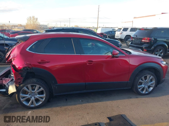 2022 Mazda CX-30 S Carbon Edition с VIN 3MVDMBCL4NM431242, выставлен на аукционе IAAI как лот 41851636 с пробегом 40 982 миль миль и . История ставок и продаж доступна на DreamBid. Изображение 13.