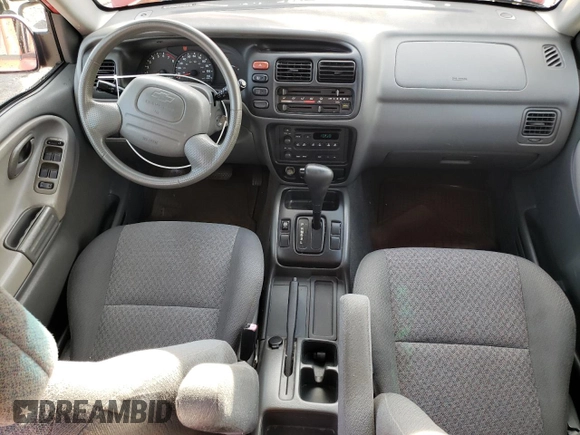 2003 Chevrolet Tracker with VIN 2CNBE13CX36943395, listed as a Copart auction lot 70964574 with 118,975 mi miles and Salvage title. Bid and sale history available at DreamBid. Image 8.
