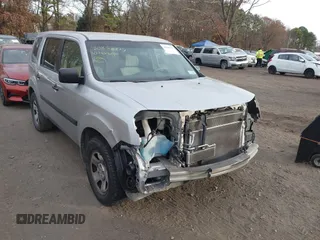 2010 Honda Pilot LX with VIN 5FNYF4H29AB002203, listed as a IAAI auction lot 40858777 with 128,621 mi miles and . Bid and sale history available at DreamBid. Image 6.