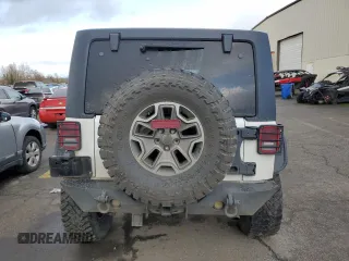 2015 Jeep Wrangler Unlimited Rubicon with VIN 1C4BJWFGXFL693566, listed as a Copart auction lot 46628765 with 70,128 mi miles and Salvage Title. Bid and sale history available at carsss.com. Image 6.