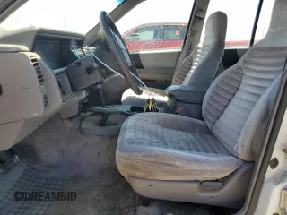 1993 Jeep Grand Cherokee Laredo с VIN 1J4GZ58S2PC654248, выставлен на аукционе Copart как лот 61259735 с пробегом 251 360 миль миль и Списание • Salvage title. История ставок и продаж доступна на DreamBid. Изображение 7.