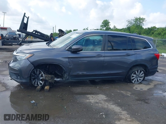 2019 Honda Pilot EX-L with VIN 5FNYF5H52KB039336, listed as a IAAI auction lot 42108456 with 220,307 mi miles and . Bid and sale history available at carsss.com. Image 14.