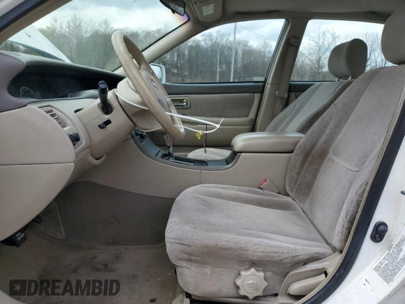 2002 Toyota Avalon XL with VIN 4T1BF28B42U250096, listed as a Copart auction lot 51817975 with 154,305 mi miles and Salvage Title. Bid and sale history available at DreamBid. Image 7.