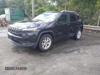 2015 Jeep Cherokee Latitude z VIN 1C4PJMCB4FW648897, wystawiony jako IAAI lot #42182493 z przebiegiem 129 457 mil mil oraz . Historia ofert i sprzedaży dostępna na DreamBid. Obrazek 2.