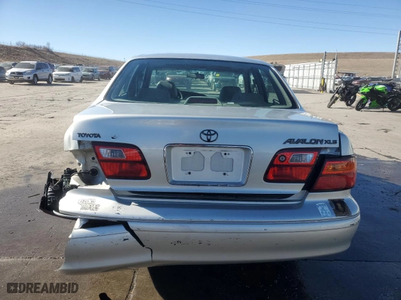 1999 Toyota Avalon XL with VIN 4T1BF18BXXU330486, listed as a Copart auction lot 47276985 with NaN miles and Salvage Title. Bid and sale history available at carsss.com. Image 6.