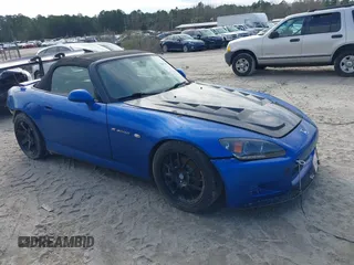 2002 Honda S2000 z VIN JHMAP11452T009221, wystawiony jako IAAI lot #38811161 z przebiegiem 67 818 mil mil oraz . Historia ofert i sprzedaży dostępna na DreamBid. Obrazek 1.