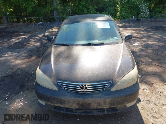 2006 Toyota Camry LE z VIN 4T1BF30KX6U628056, wystawiony jako IAAI lot #42410228 z przebiegiem 197 487 mil mil oraz . Historia ofert i sprzedaży dostępna na DreamBid. Obrazek 6.