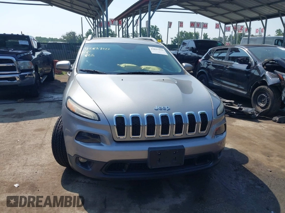 2015 Jeep Cherokee Latitude with VIN 1C4PJMCS2FW789144, listed as a IAAI auction lot 42837222 with 99,759 mi miles and . Bid and sale history available at DreamBid. Image 13.